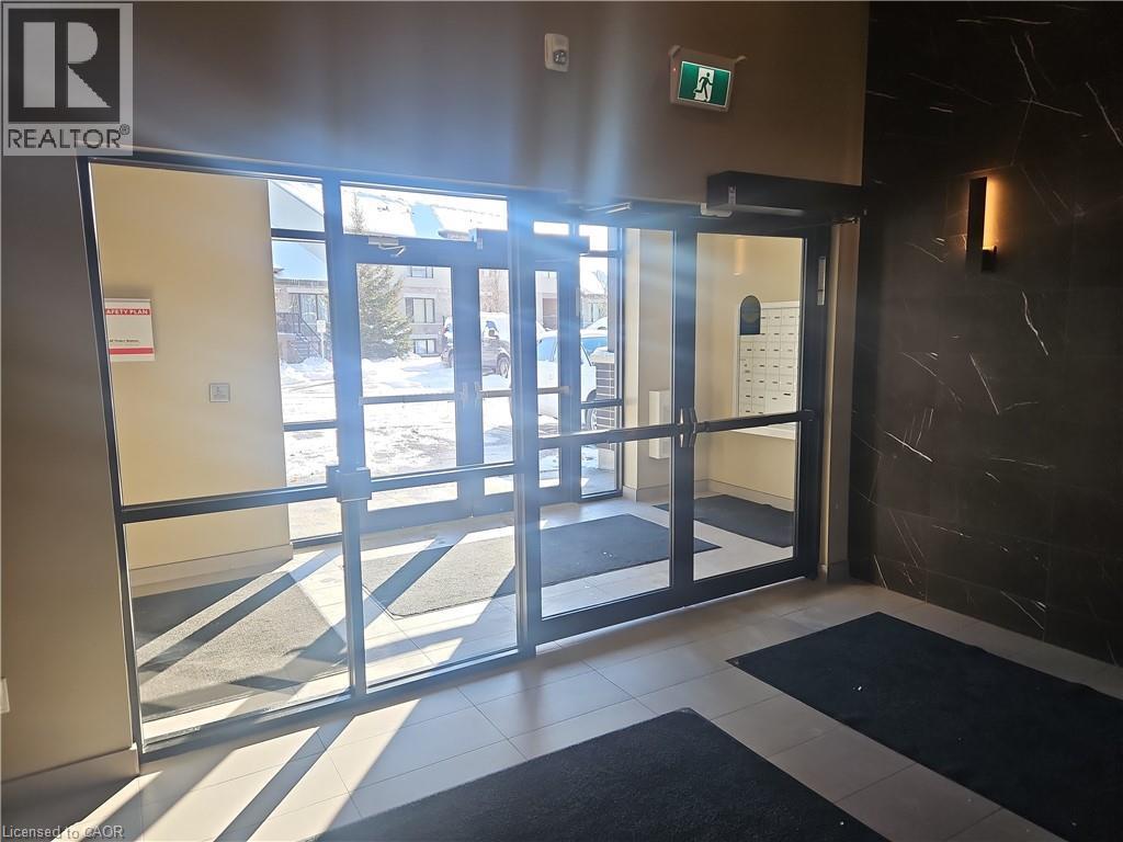 Lobby featuring floor to ceiling windows - 249 Grey Silo Road Unit# 301, Waterloo, ON - Indoor Photo Showing Other Room