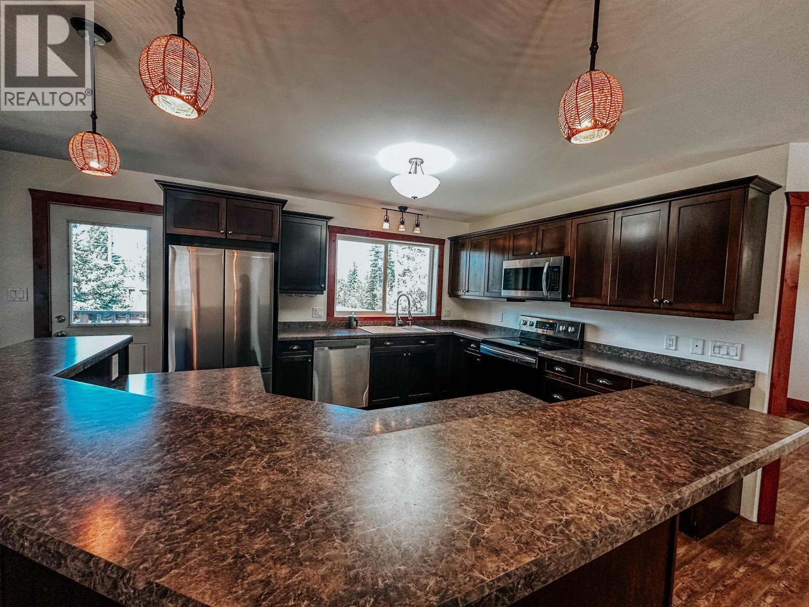 7604 Womack Road, Deka Lake / Sulphurous / Hathaway Lakes, BC - Indoor Photo Showing Kitchen With Stainless Steel Kitchen