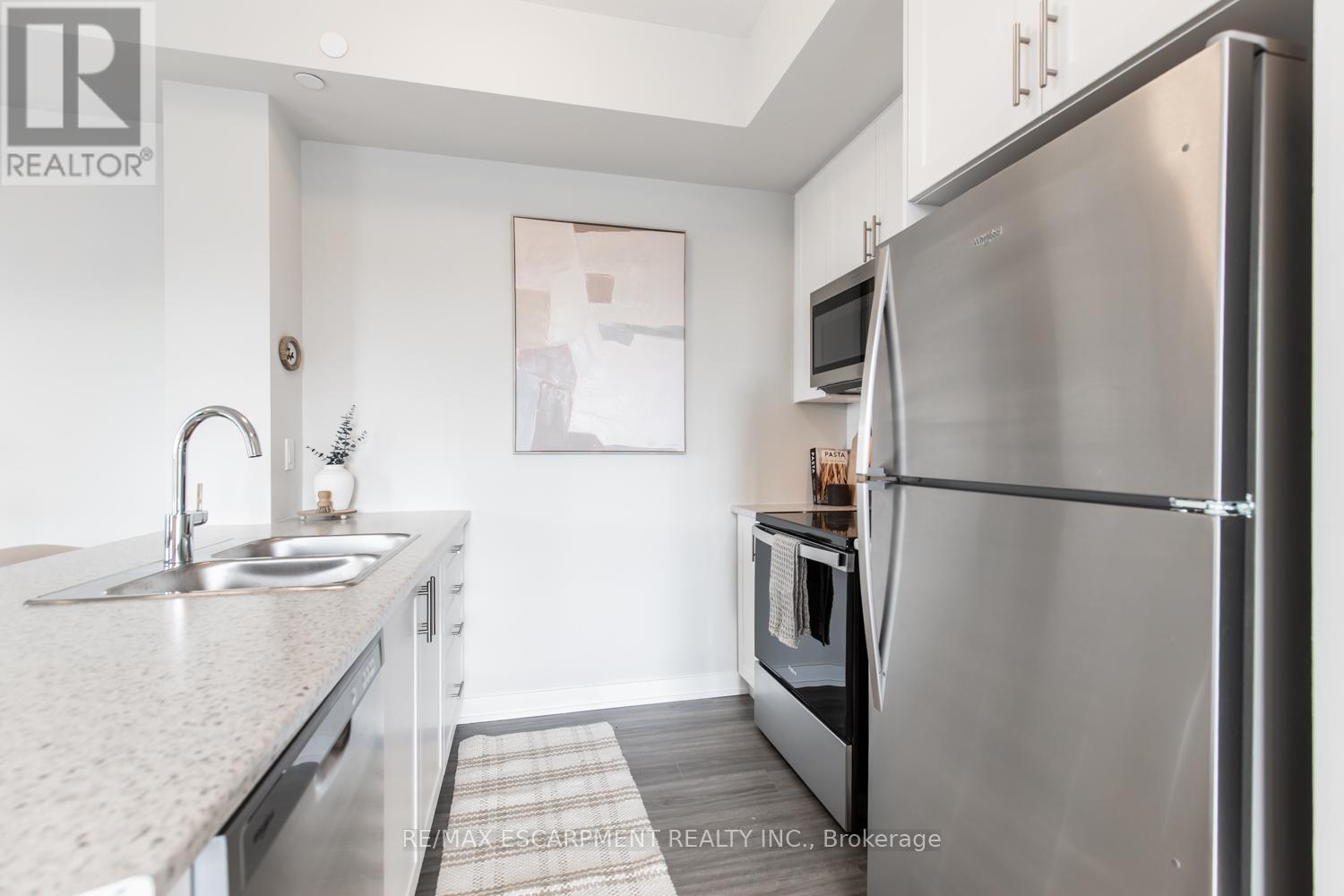 1106 - 870 Queenston Road, Hamilton, ON - Indoor Photo Showing Kitchen With Stainless Steel Kitchen With Double Sink With Upgraded Kitchen
