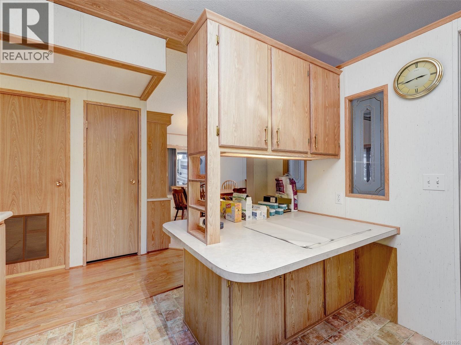 LOTS OF COUNTER AND CUPBOARD SPACE - 2694 Mathew Pl, Malahat, BC