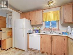 WINDOW ABOVE KITCHEN SINK -