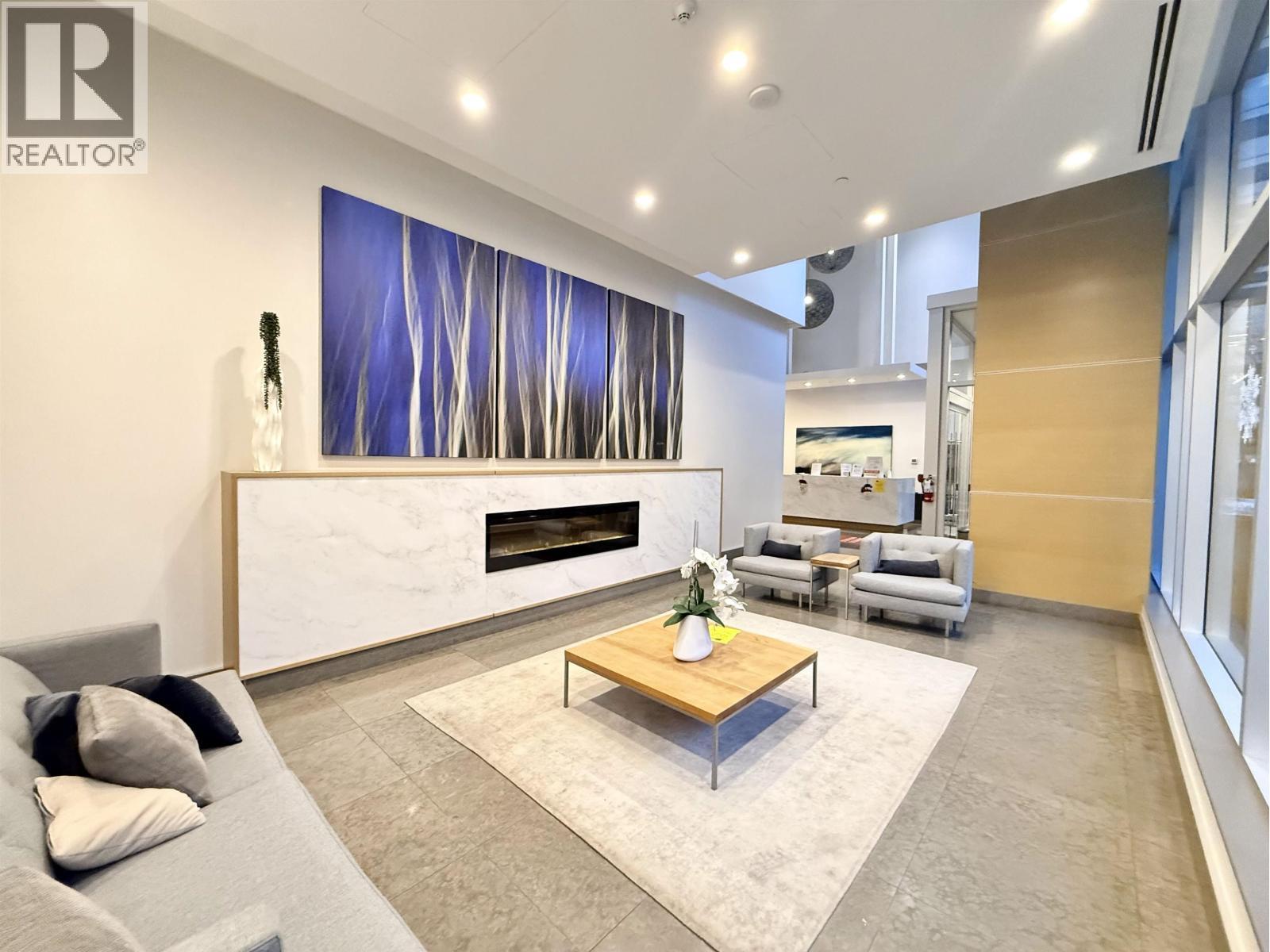 3603 4670 Assembly Way, Burnaby, BC - Indoor Photo Showing Living Room With Fireplace