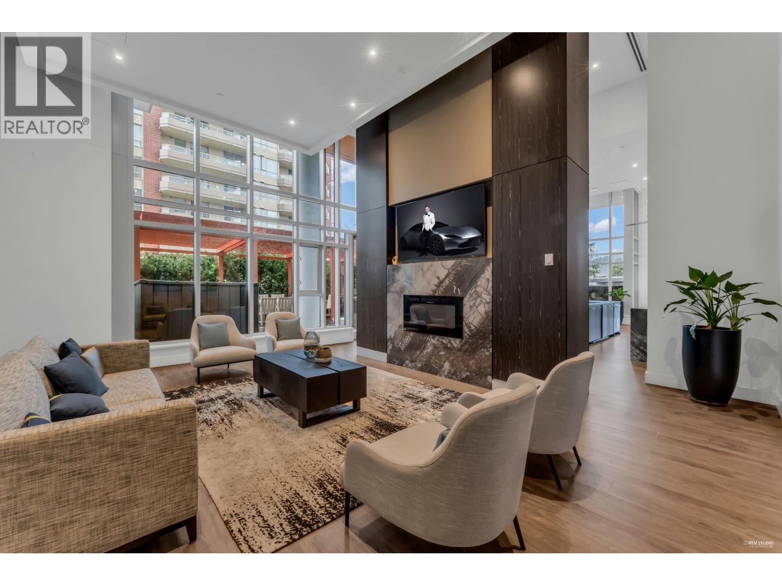 1102 520 Como Lake Avenue, Coquitlam, BC - Indoor Photo Showing Living Room With Fireplace