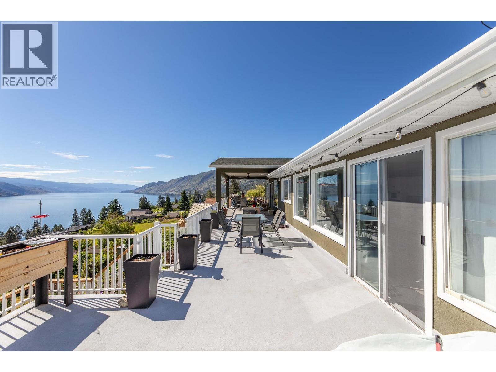 6471 Vernon Avenue, Peachland, BC - Outdoor With Body Of Water With Deck Patio Veranda With Exterior