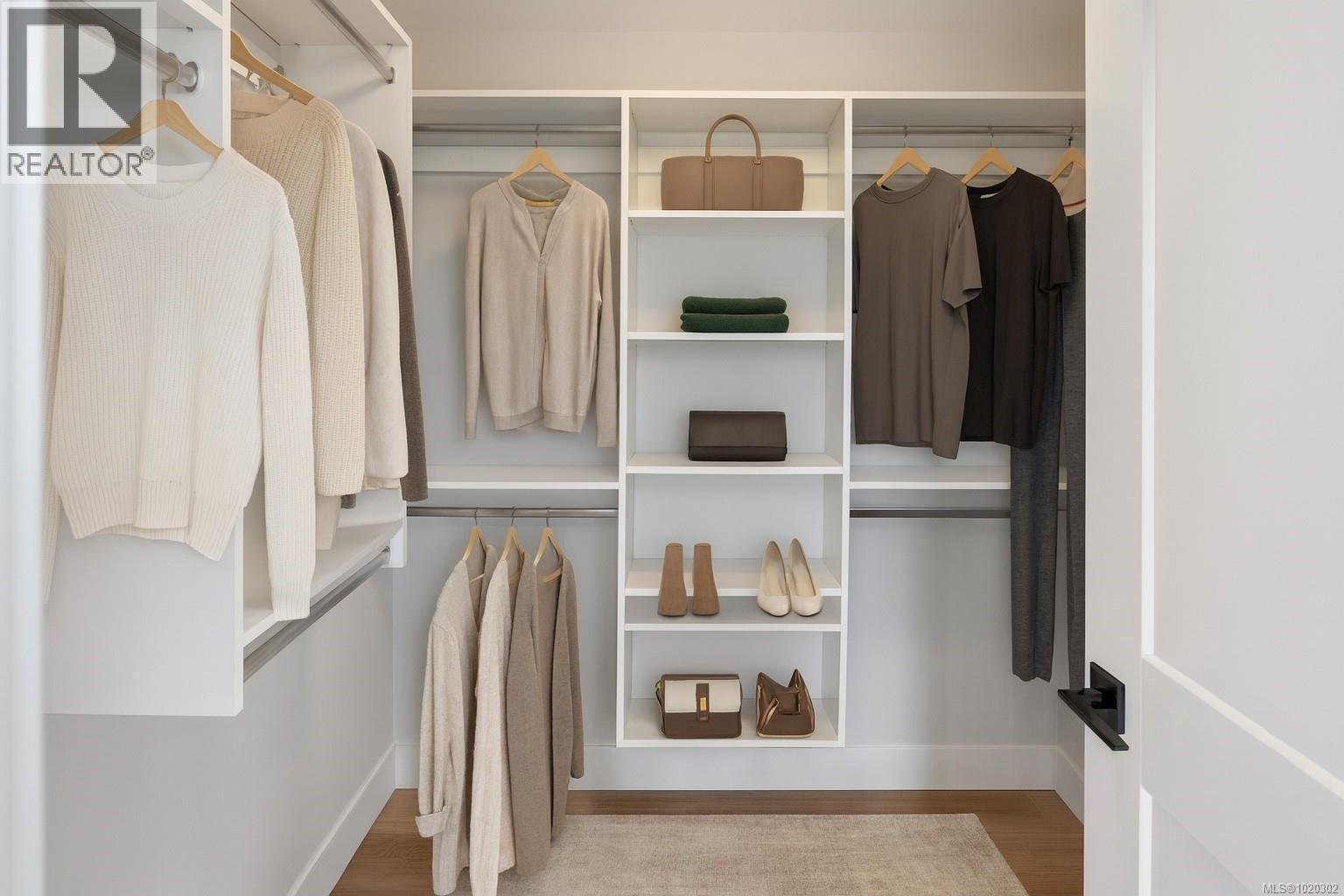 Walk in closet with light wood-style floors - A 6521 Noblewood Pl, Sooke, BC - Indoor