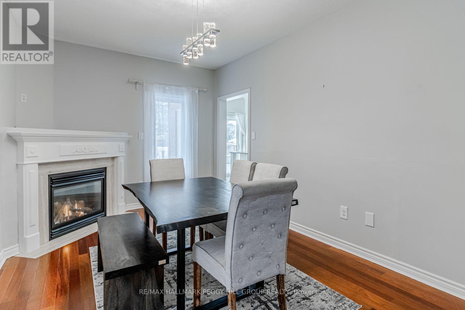 6 Laurelwood Lane, Barrie, ON - Indoor Photo Showing Dining Room With Fireplace