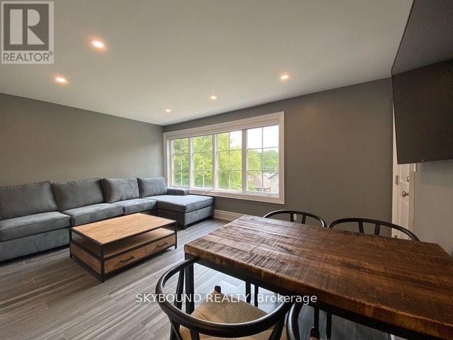 2 - 163 Riverside Drive, Toronto, ON - Indoor Photo Showing Living Room