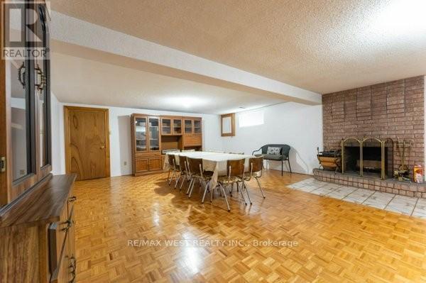 8 Hearne Avenue, Toronto, ON - Indoor Photo Showing Dining Room With Fireplace