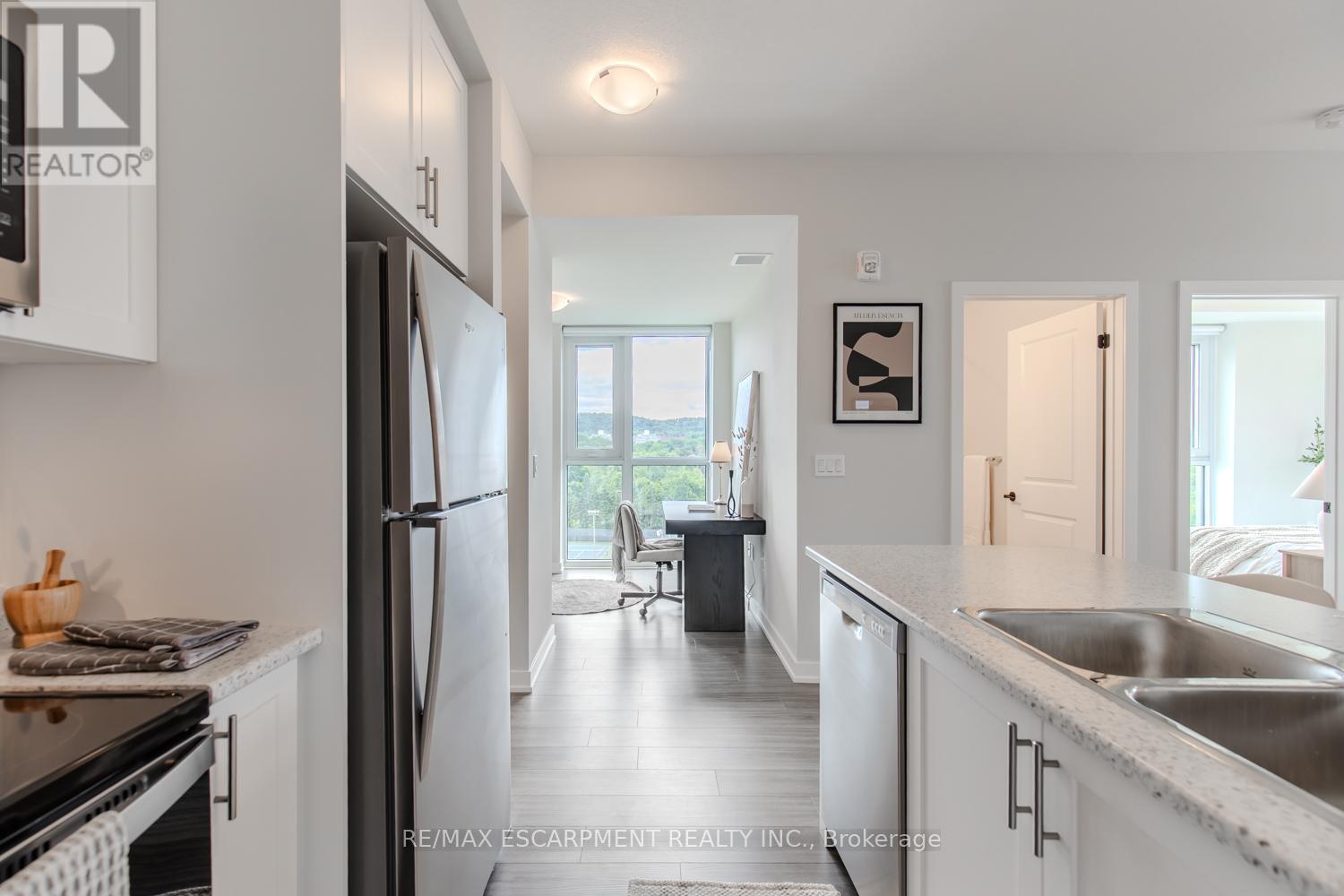 1311 - 870 Queenston Road, Hamilton, ON - Indoor Photo Showing Kitchen With Stainless Steel Kitchen With Double Sink With Upgraded Kitchen