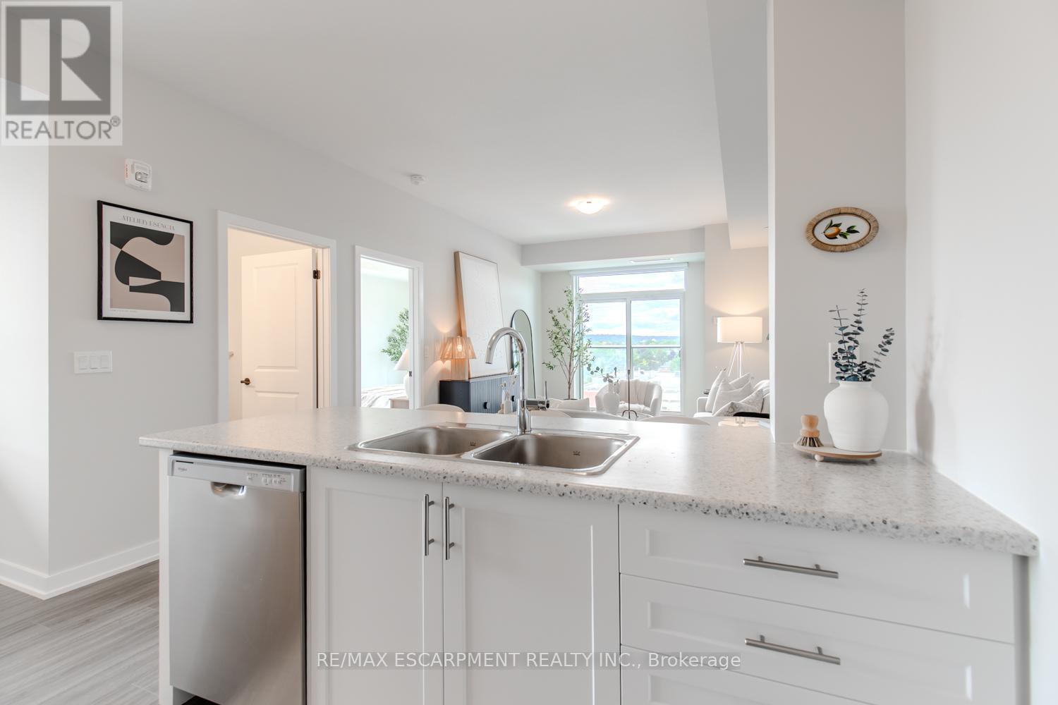 1311 - 870 Queenston Road, Hamilton, ON - Indoor Photo Showing Kitchen With Double Sink