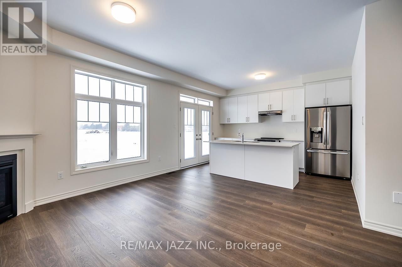 67 Debois Street, Kawartha Lakes (Lindsay), ON - Indoor Photo Showing Kitchen With Fireplace