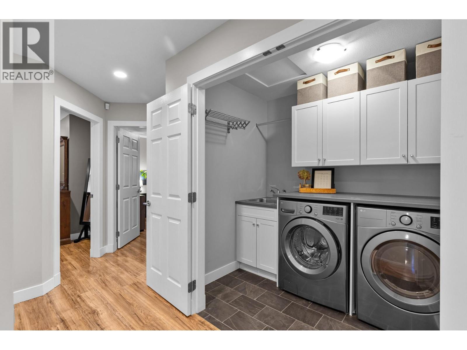 Upstairs laundry - 13265 Apex Drive, Lake Country, BC - Indoor Photo Showing Laundry Room