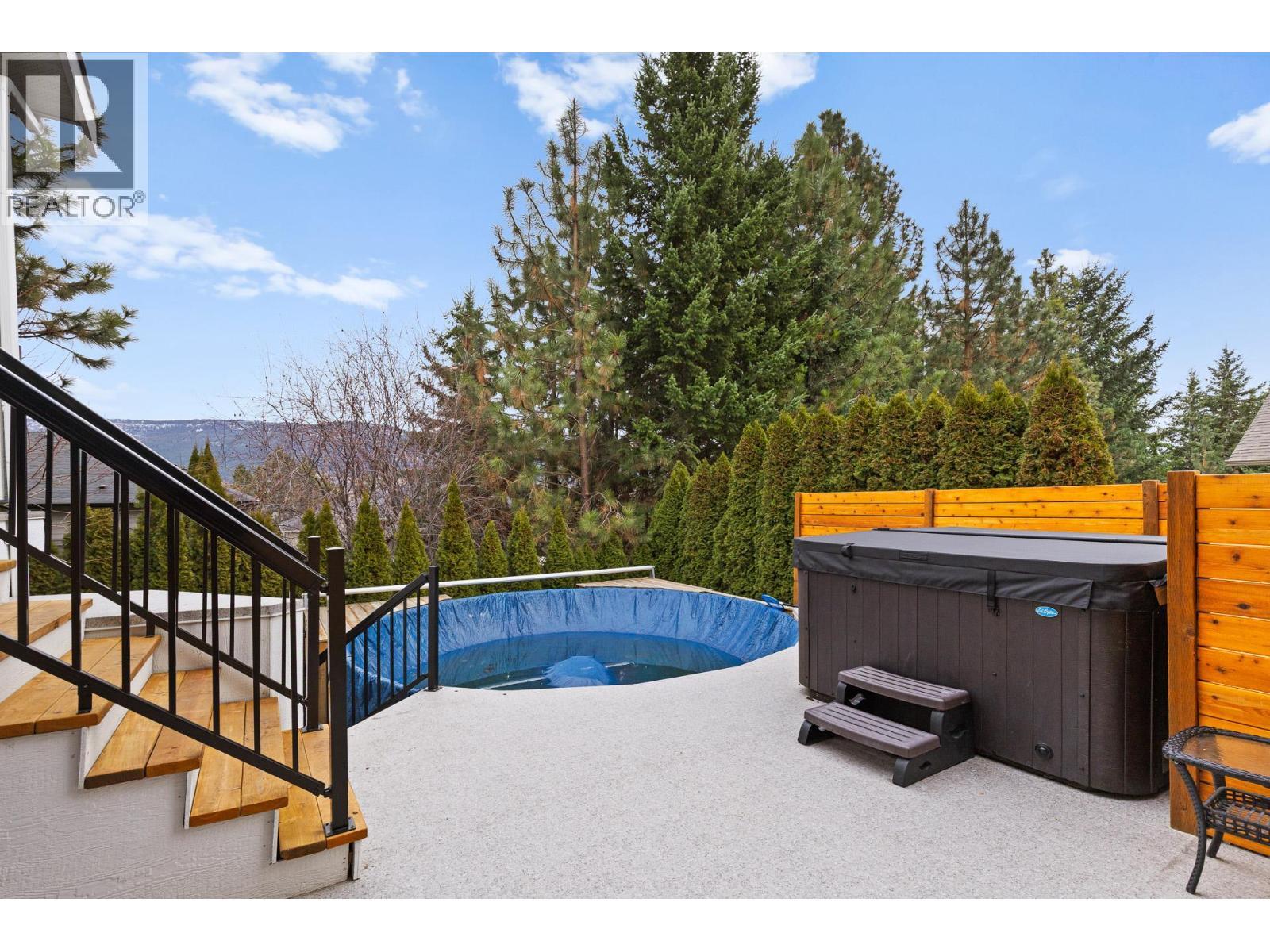 Hot tub & above ground pool - 13265 Apex Drive, Lake Country, BC - Outdoor With Above Ground Pool With Backyard