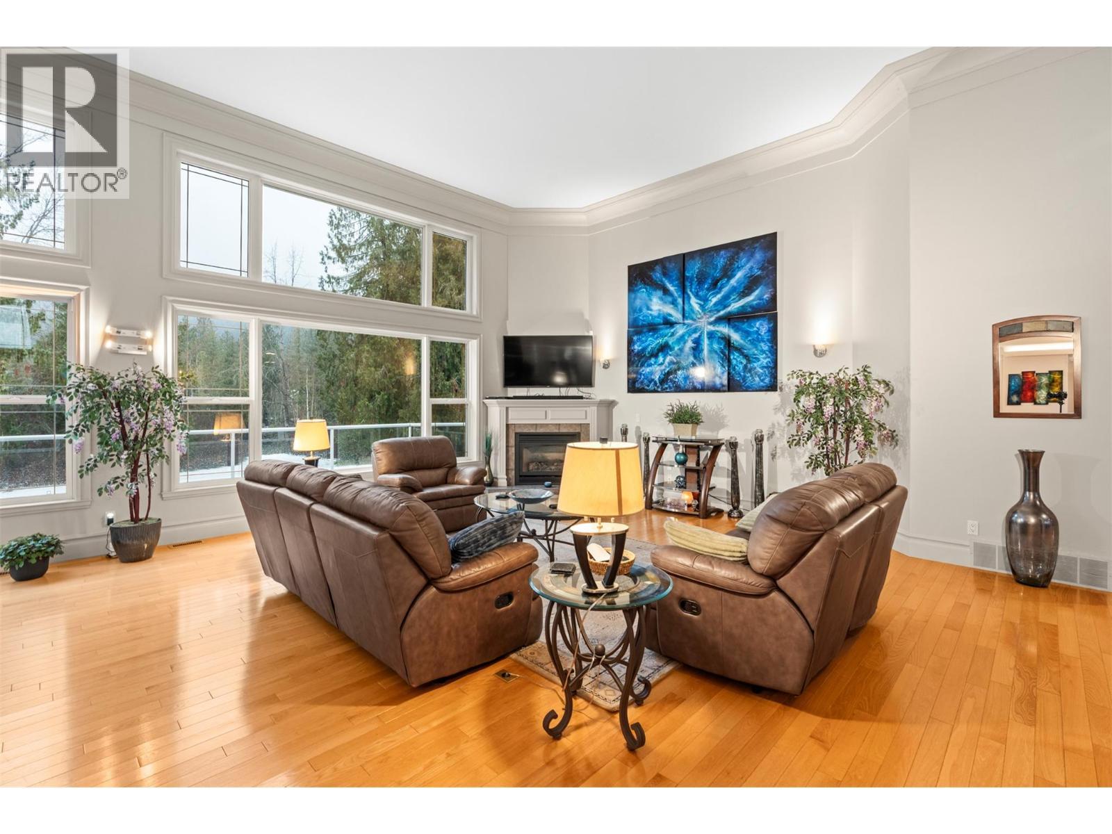 1200 Trans Canada Highway, Sicamous, BC - Indoor Photo Showing Living Room With Fireplace