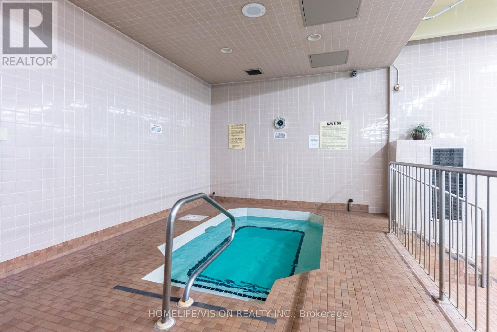 1105 - 75 Wynford Heights Crescent, Toronto, ON - Photo Showing Other Room With In Ground Pool