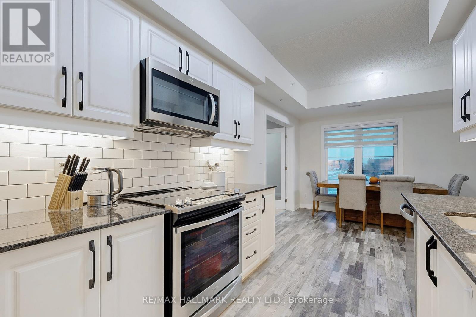 417 - 54 Koda Street, Barrie, ON - Indoor Photo Showing Kitchen With Upgraded Kitchen