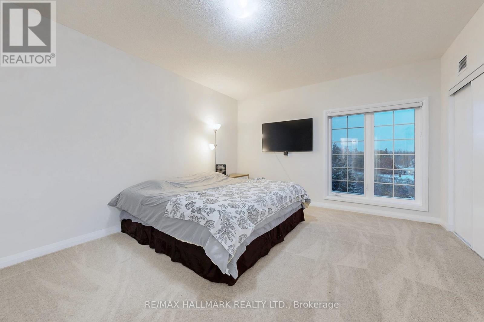 417 - 54 Koda Street, Barrie, ON - Indoor Photo Showing Bedroom