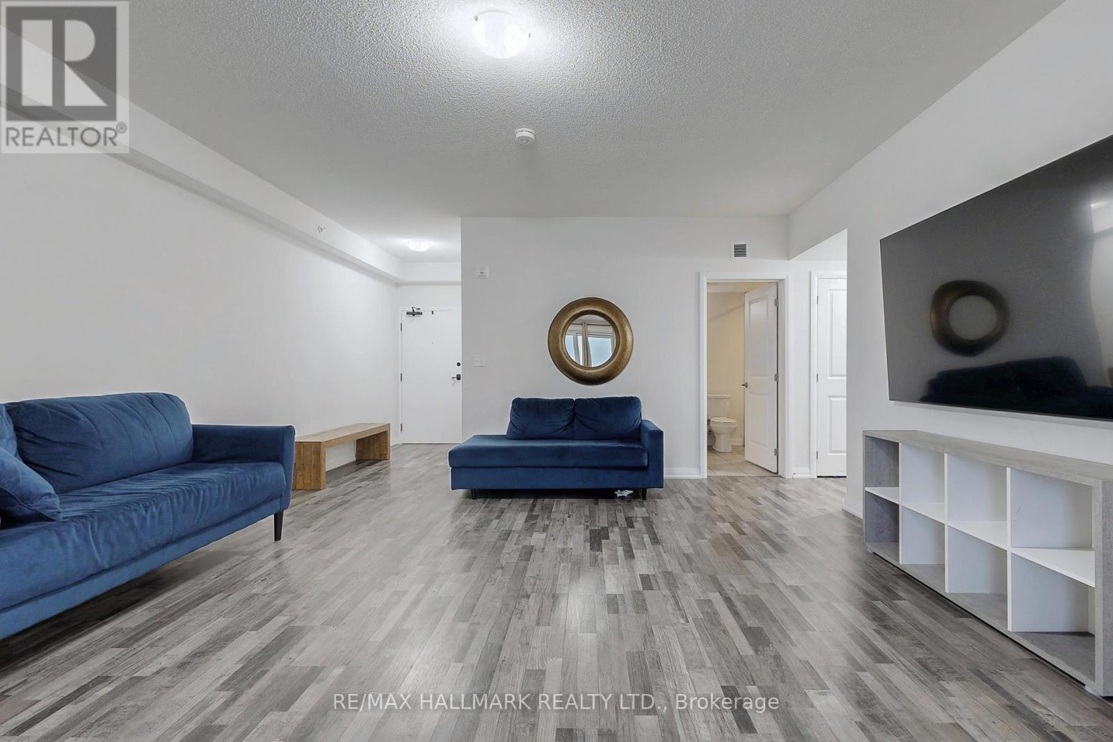 417 - 54 Koda Street, Barrie, ON - Indoor Photo Showing Living Room