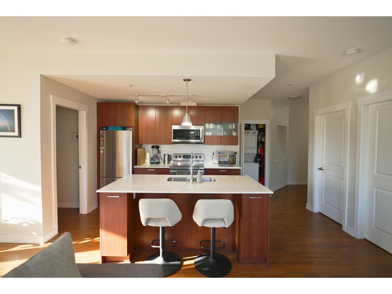 204 13339 102A Avenue, Surrey, BC - Indoor Photo Showing Kitchen With Stainless Steel Kitchen