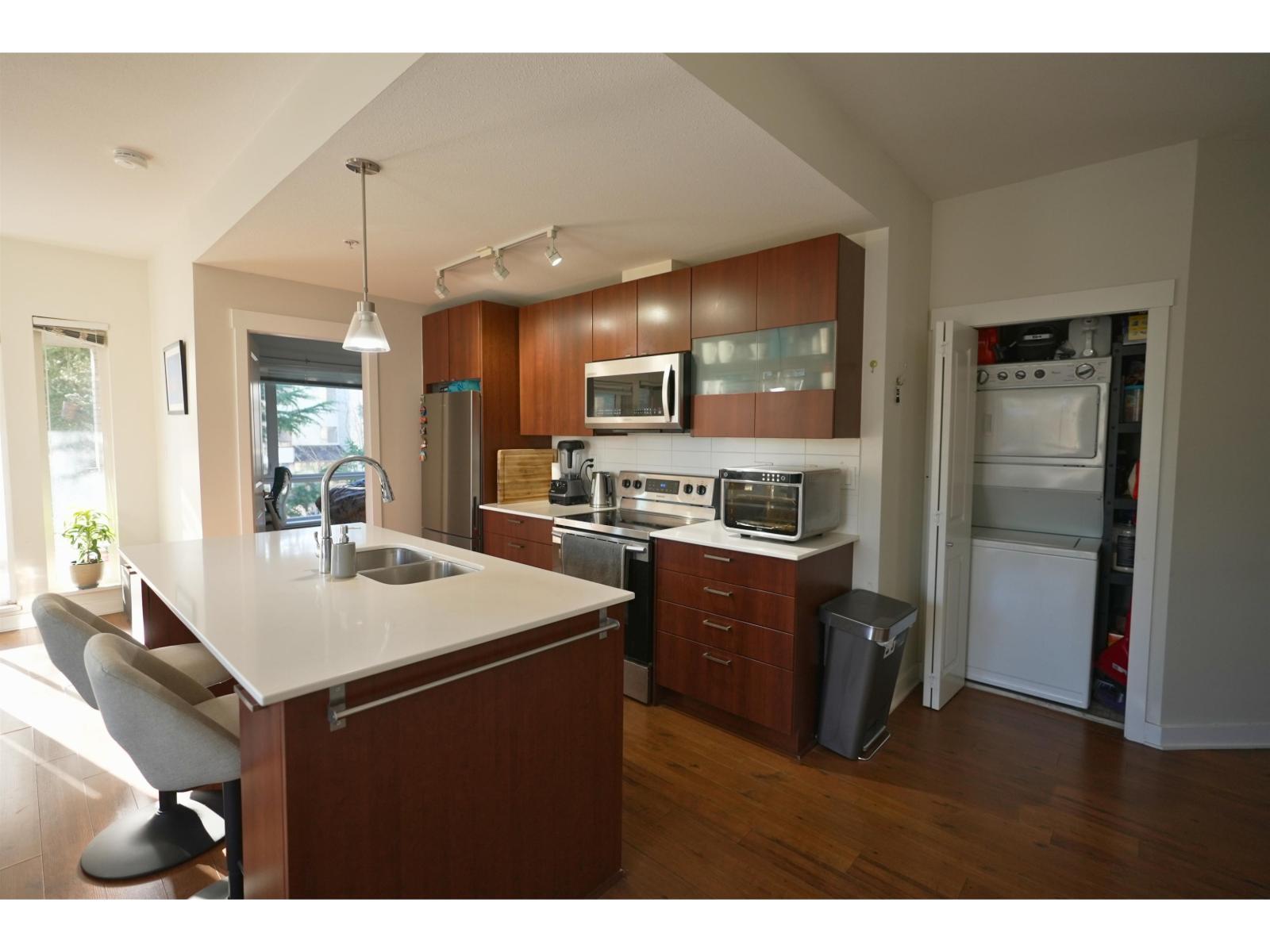 204 13339 102A Avenue, Surrey, BC - Indoor Photo Showing Kitchen With Stainless Steel Kitchen With Double Sink