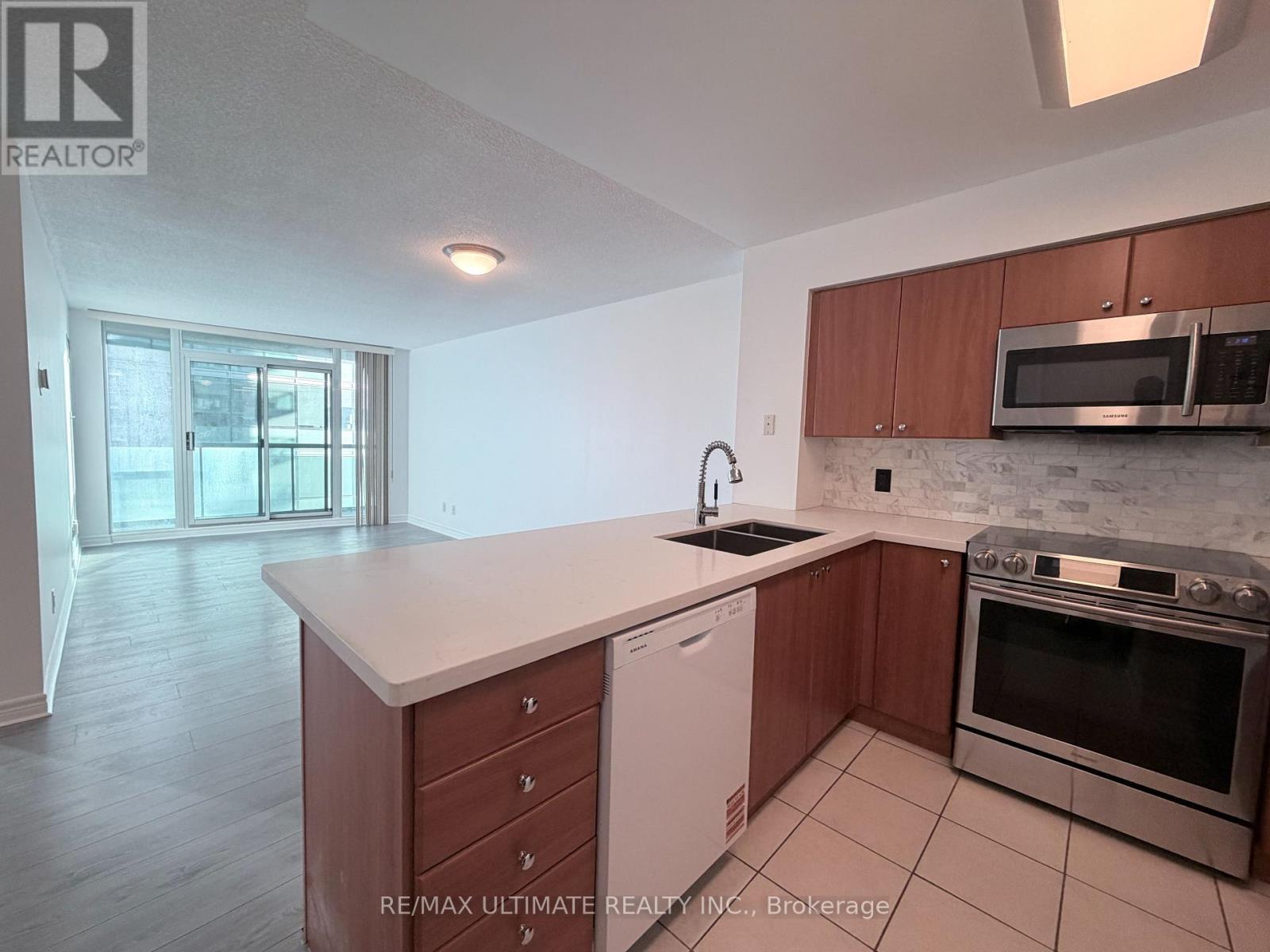 2308 - 30 Grand Trunk Crescent, Toronto, ON - Indoor Photo Showing Kitchen With Double Sink