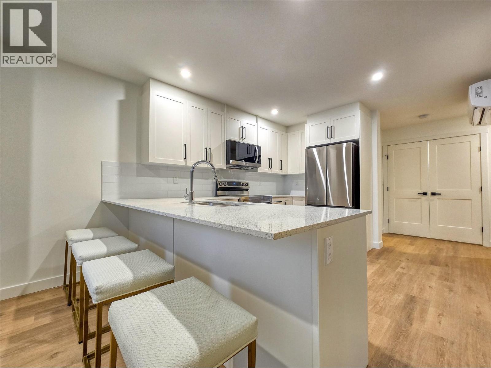 2098 Pine Tree Way Unit# 42, Invermere, BC - Indoor Photo Showing Kitchen With Stainless Steel Kitchen With Upgraded Kitchen