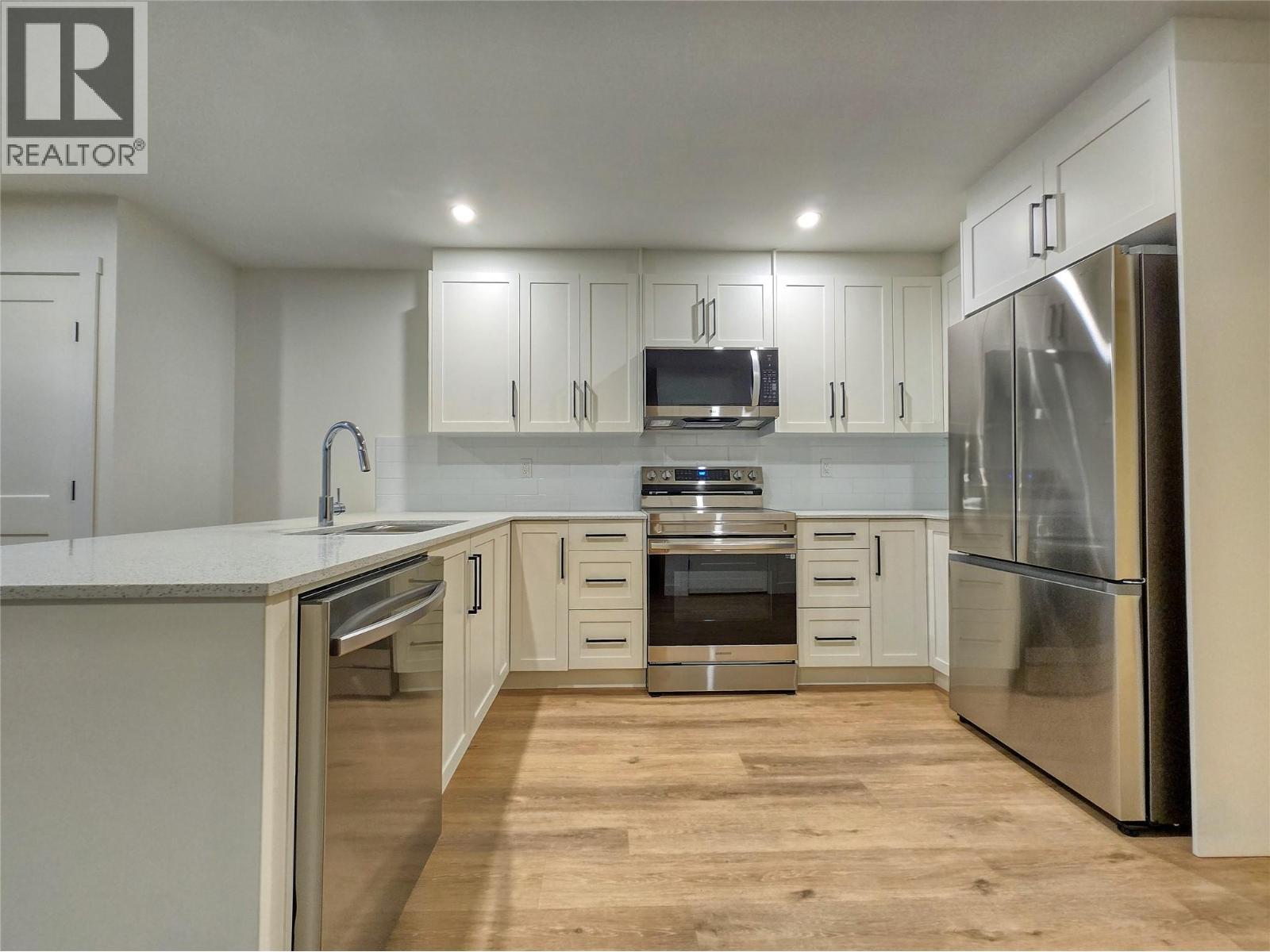2098 Pine Tree Way Unit# 42, Invermere, BC - Indoor Photo Showing Kitchen With Stainless Steel Kitchen