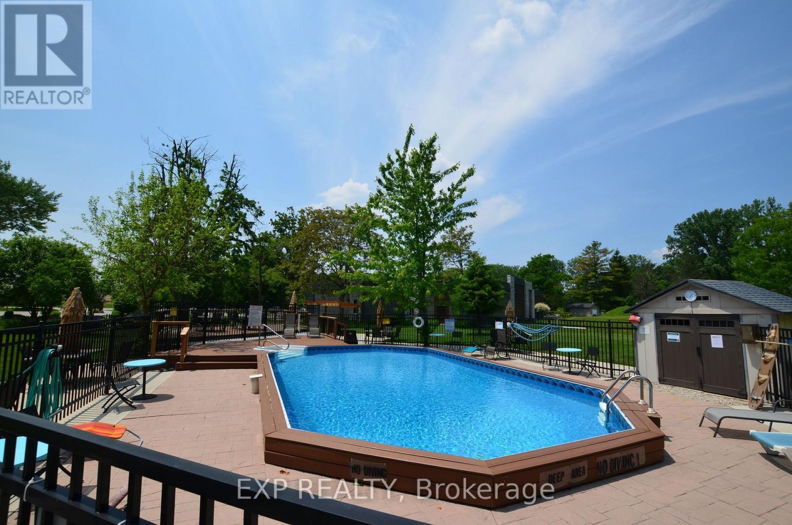 51 - 22790 Amiens Road, Middlesex Centre, ON - Outdoor With In Ground Pool With Backyard