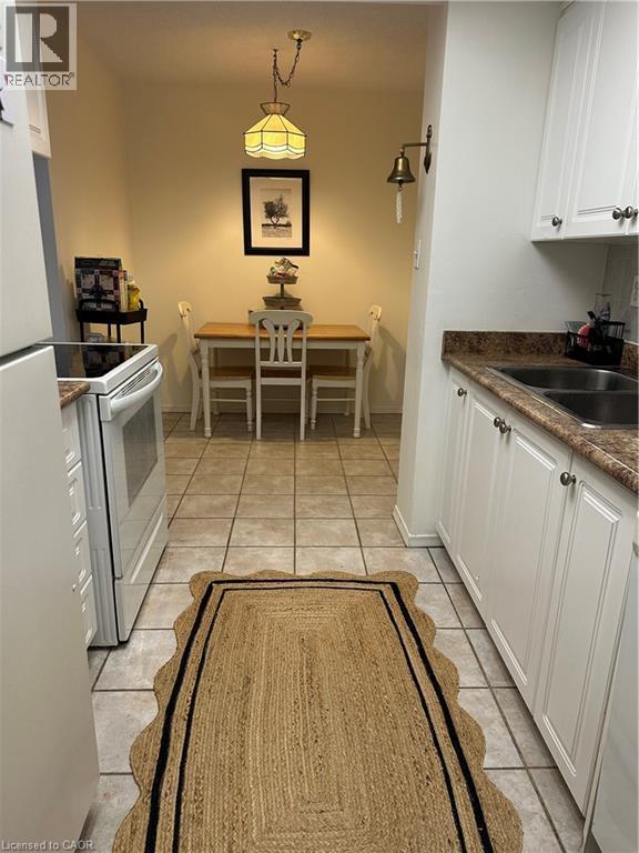 1515 Lakeshore Road E Unit# 1805, Mississauga, ON - Indoor Photo Showing Kitchen With Double Sink