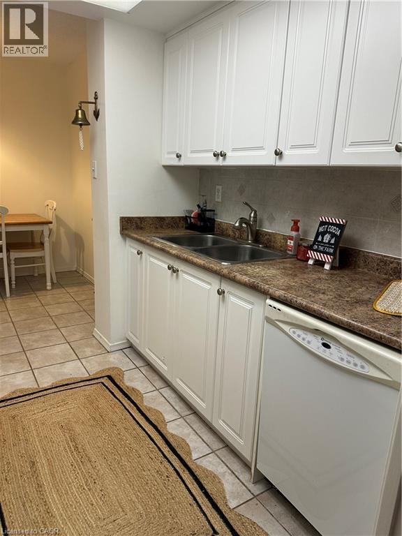 1515 Lakeshore Road E Unit# 1805, Mississauga, ON - Indoor Photo Showing Kitchen With Double Sink