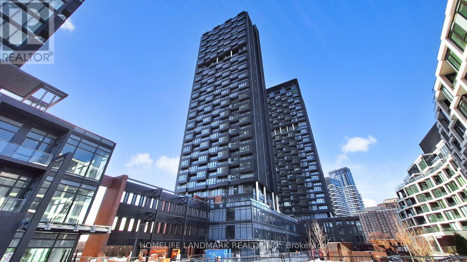 1520 - 1 Quarrington Lane, Toronto, ON - Outdoor With Facade