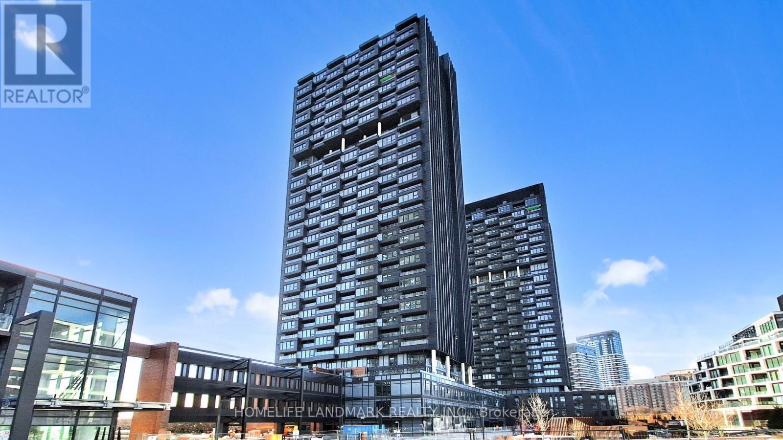 1520 - 1 Quarrington Lane, Toronto, ON - Outdoor With Facade