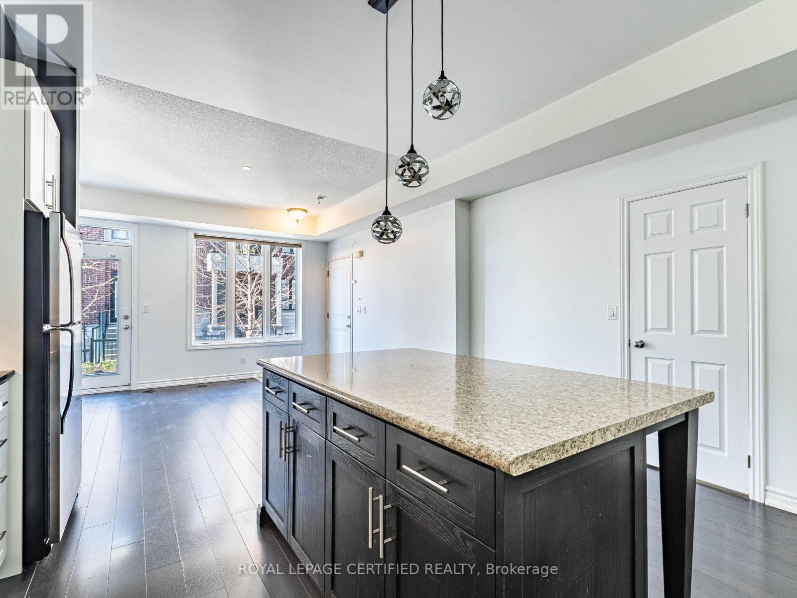104 - 30 Carnation Avenue, Toronto, ON - Indoor Photo Showing Kitchen