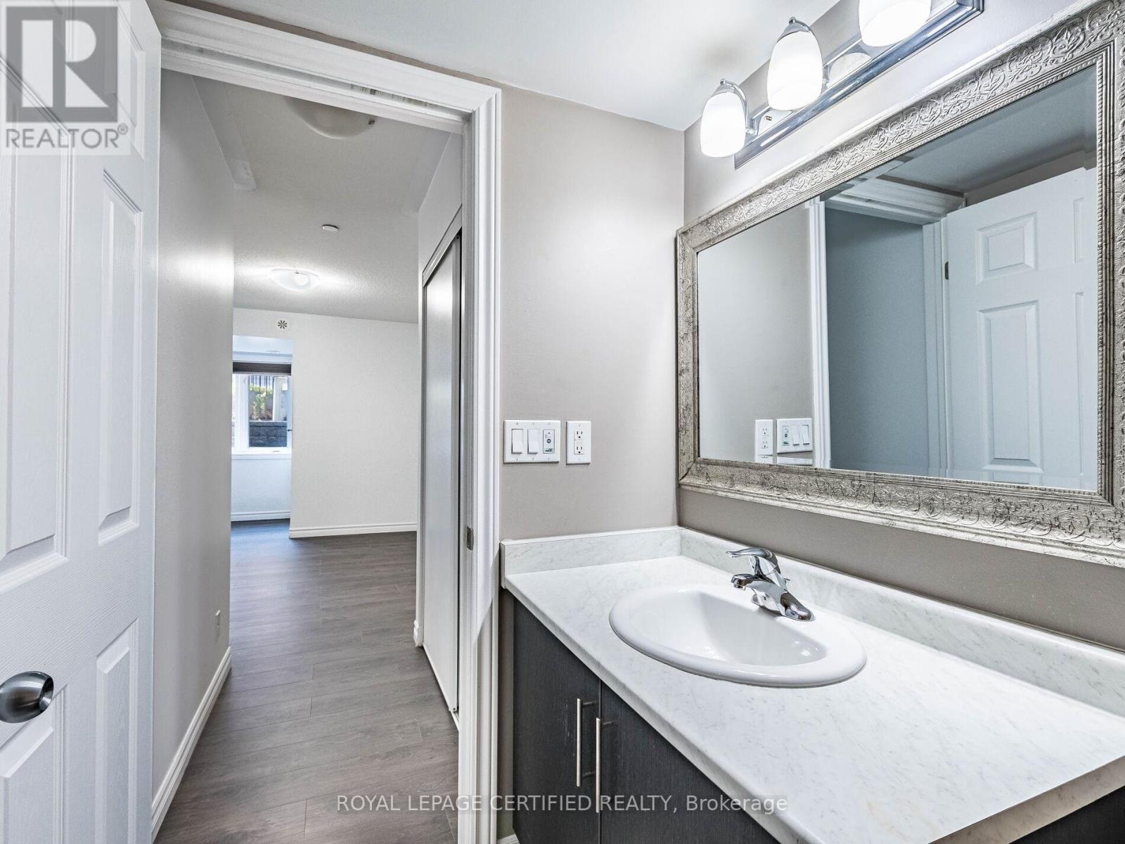 104 - 30 Carnation Avenue, Toronto, ON - Indoor Photo Showing Bathroom