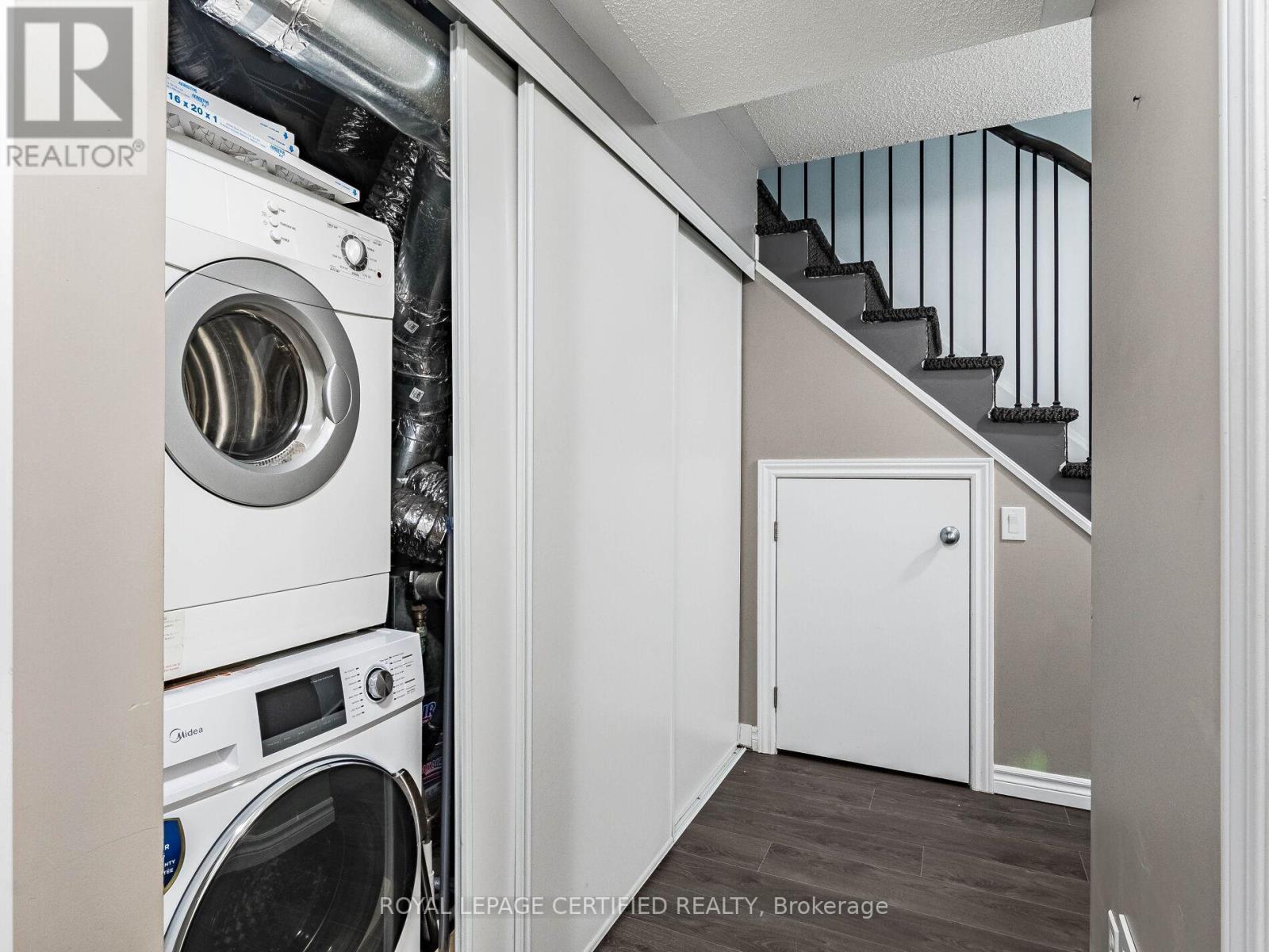 104 - 30 Carnation Avenue, Toronto, ON - Indoor Photo Showing Laundry Room