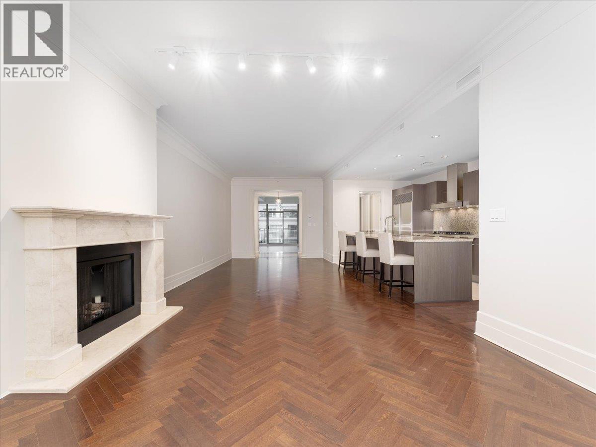 401 508 Waters Edge Crescent, West Vancouver, BC - Indoor Photo Showing Living Room With Fireplace