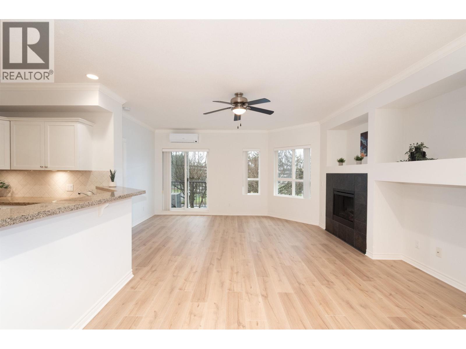 202 12090 227 Street, Maple Ridge, BC - Indoor With Fireplace