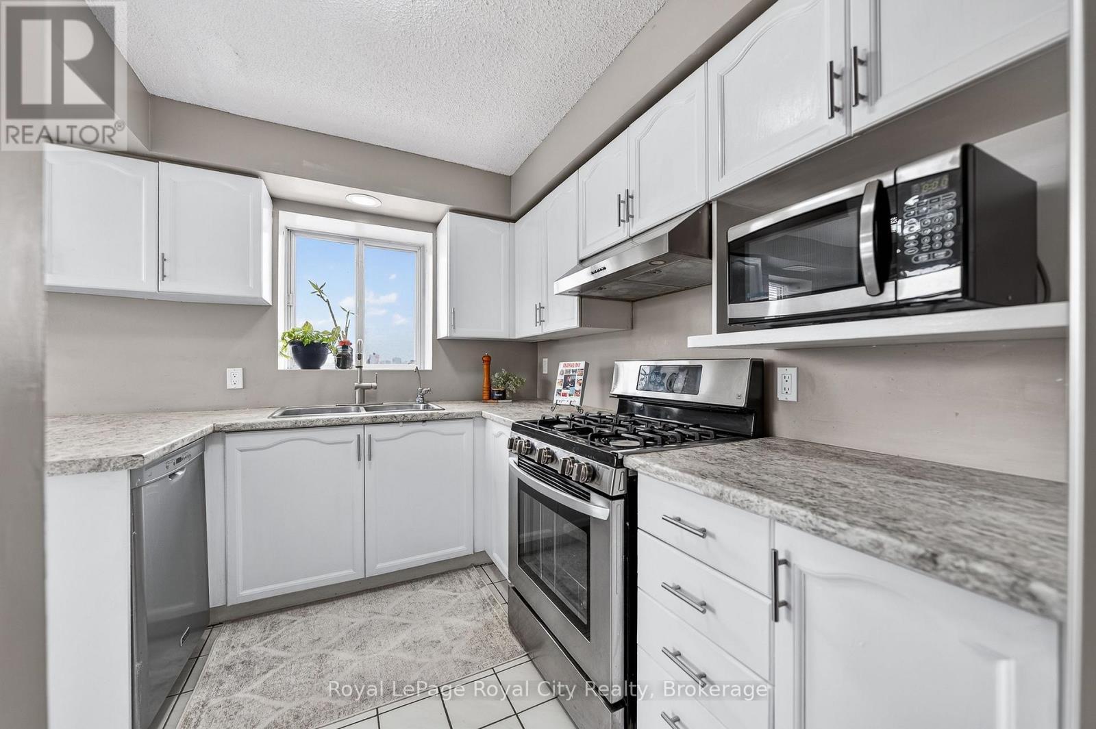701 - 281 Bristol Street, Guelph (Junction/Onward Willow), ON - Indoor Photo Showing Kitchen With Stainless Steel Kitchen