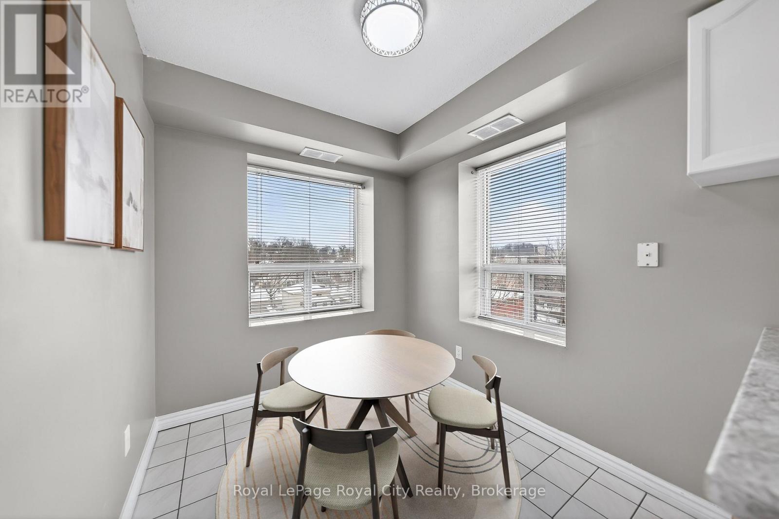 Virtually Staged Eat in Kitchen - 701 - 281 Bristol Street, Guelph (Junction/Onward Willow), ON - Indoor Photo Showing Dining Room