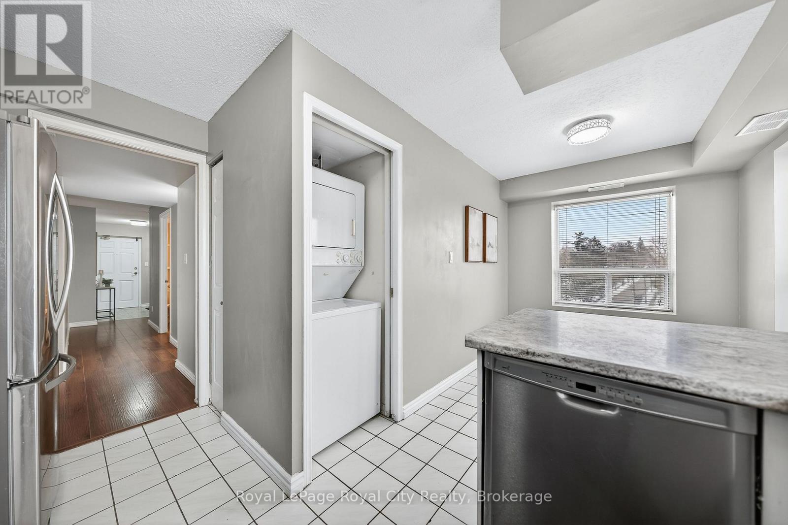 701 - 281 Bristol Street, Guelph (Junction/Onward Willow), ON - Indoor Photo Showing Laundry Room