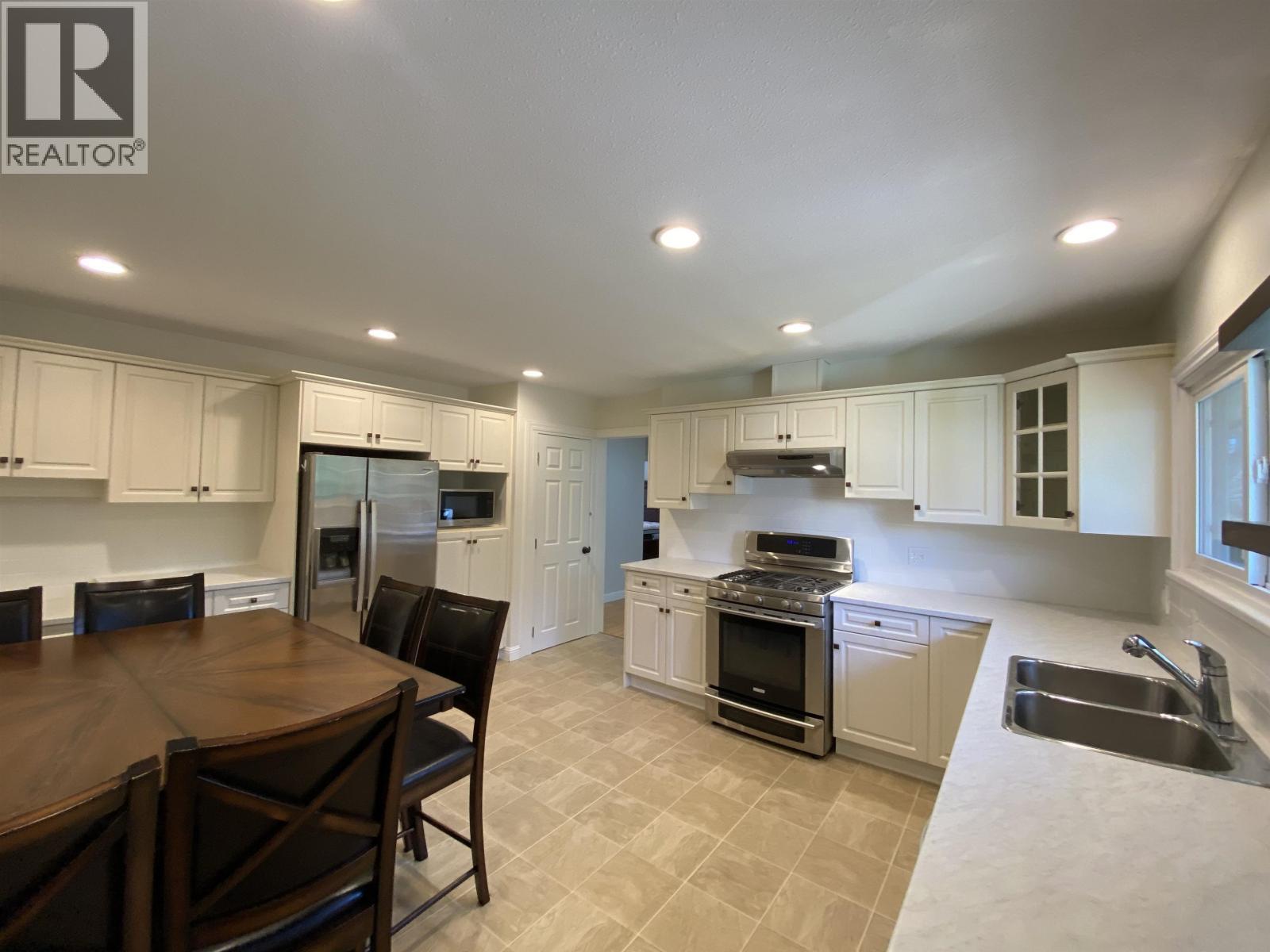 Main House 12085 York Street, Maple Ridge, BC - Indoor Photo Showing Kitchen With Double Sink