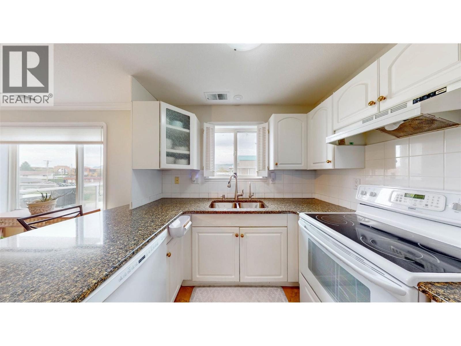6805 Cottonwood Drive Unit# 206, Osoyoos, BC - Indoor Photo Showing Kitchen With Double Sink