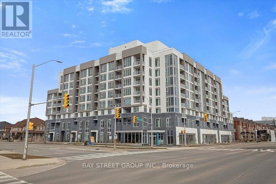 617 - 412 Silver Maple Road, Oakville, ON - Outdoor With Balcony With Facade