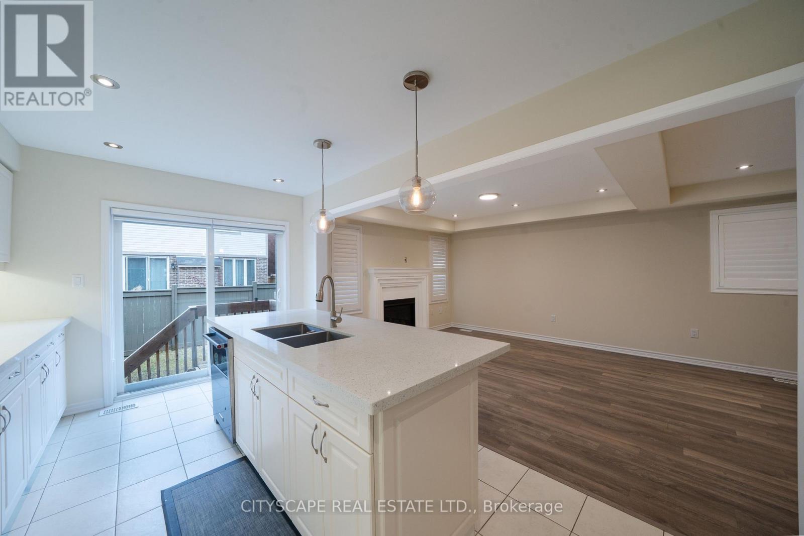 296 Jean Landing, Milton, ON - Indoor Photo Showing Kitchen With Double Sink