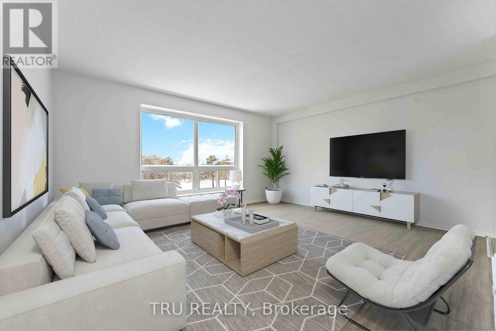 Living room virtually staged. - 8 - 898 Elmsmere Road, Ottawa, ON - Indoor Photo Showing Living Room