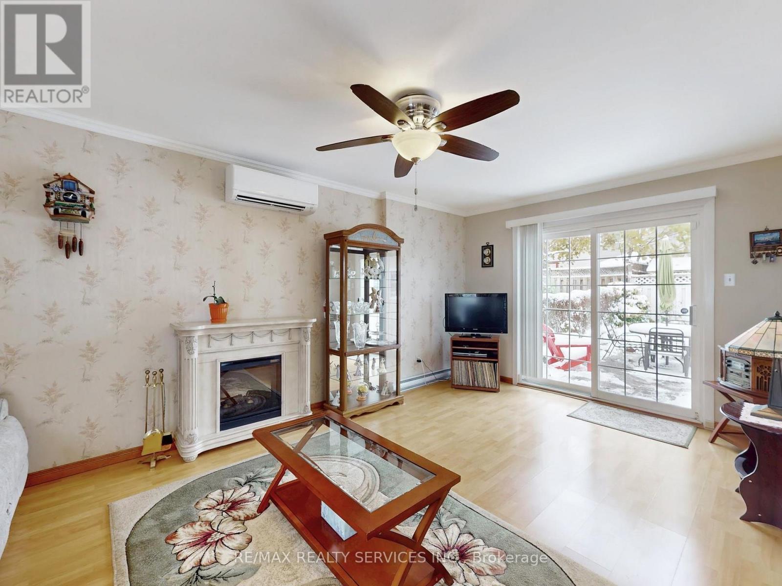 2 Grove Park Square, Brampton, ON - Indoor Photo Showing Living Room With Fireplace