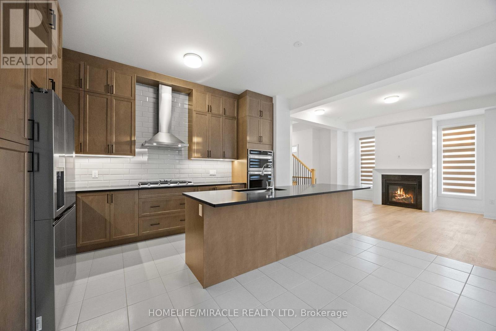 33 Spiritwood Way, Brampton, ON - Indoor Photo Showing Kitchen With Fireplace
