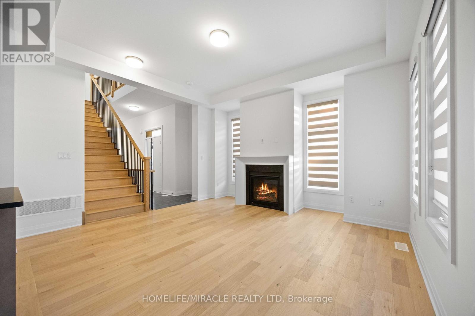 33 Spiritwood Way, Brampton, ON - Indoor Photo Showing Other Room With Fireplace