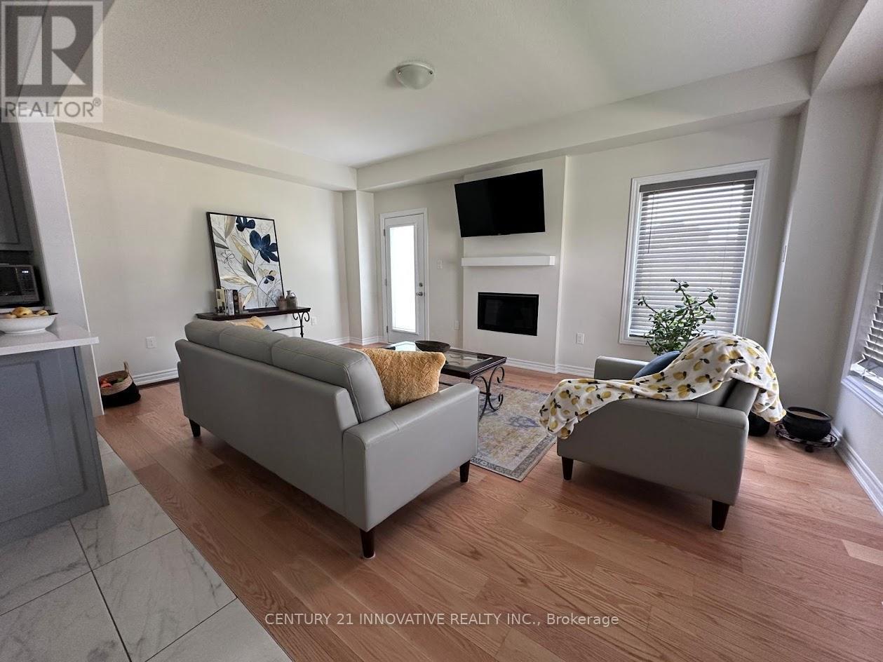 17 Gilham Way, Brant, ON - Indoor Photo Showing Living Room With Fireplace