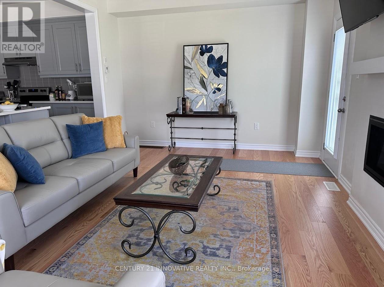 17 Gilham Way, Brant, ON - Indoor Photo Showing Living Room With Fireplace